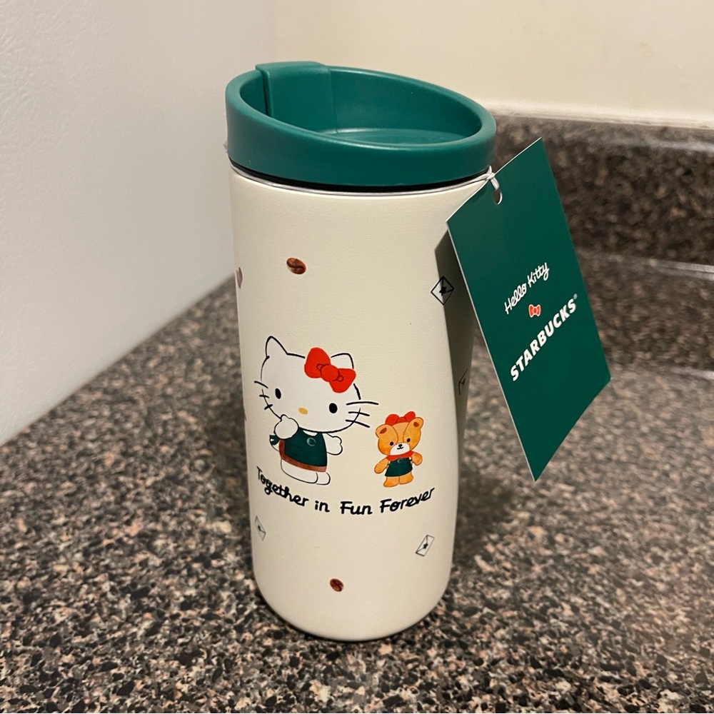 Starbucks White Tumbler with Green Lid and Hello Kitty Design 12oz NWT